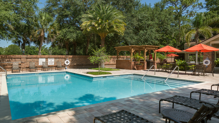 Resort-Inspired Pool with Sundeck and Lounge Seating